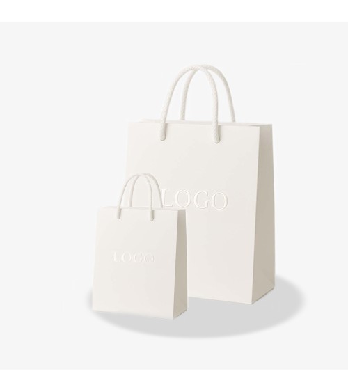 Sacs papier personnalisés blanc grand format Antarell avec gravure à chaud blanche contemporaine