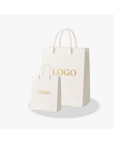 Sac cadeau blanc Antarell avec marquage or disponible en petit et grand format